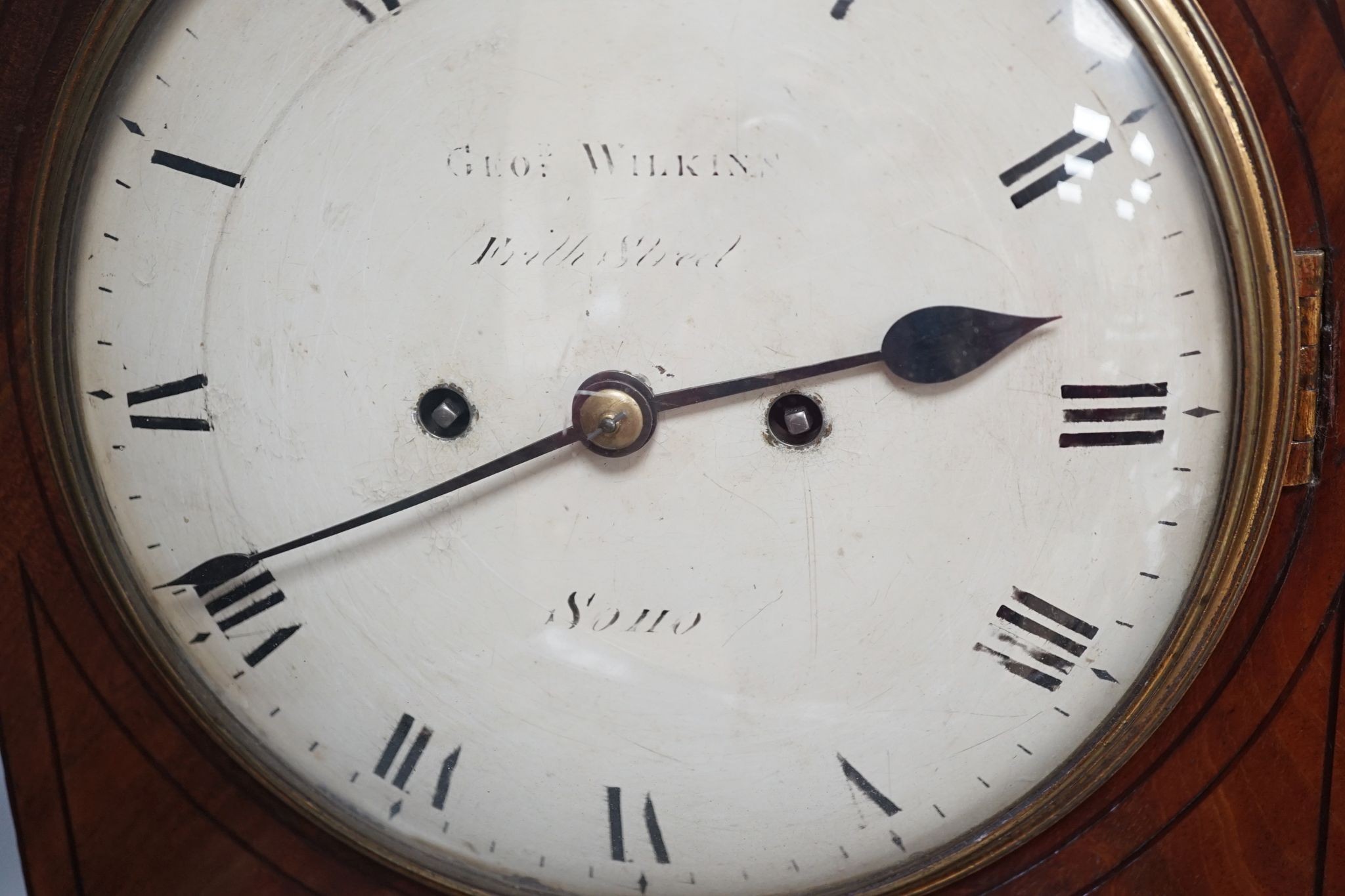 An early 19th century lancet shape mahogany mantel clock, 49cm